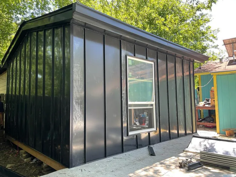 Black standing seam metal wall panels for Roof Inspection in Mountlake Terrace